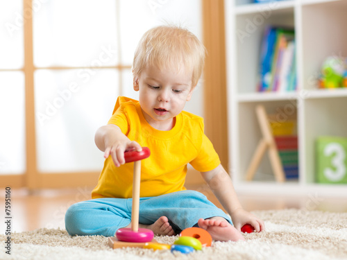 cute kid playing with color...