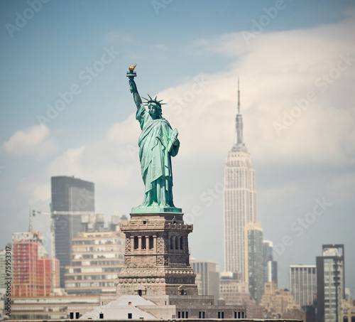 New York City, USA skyline panorama with statue of liberty