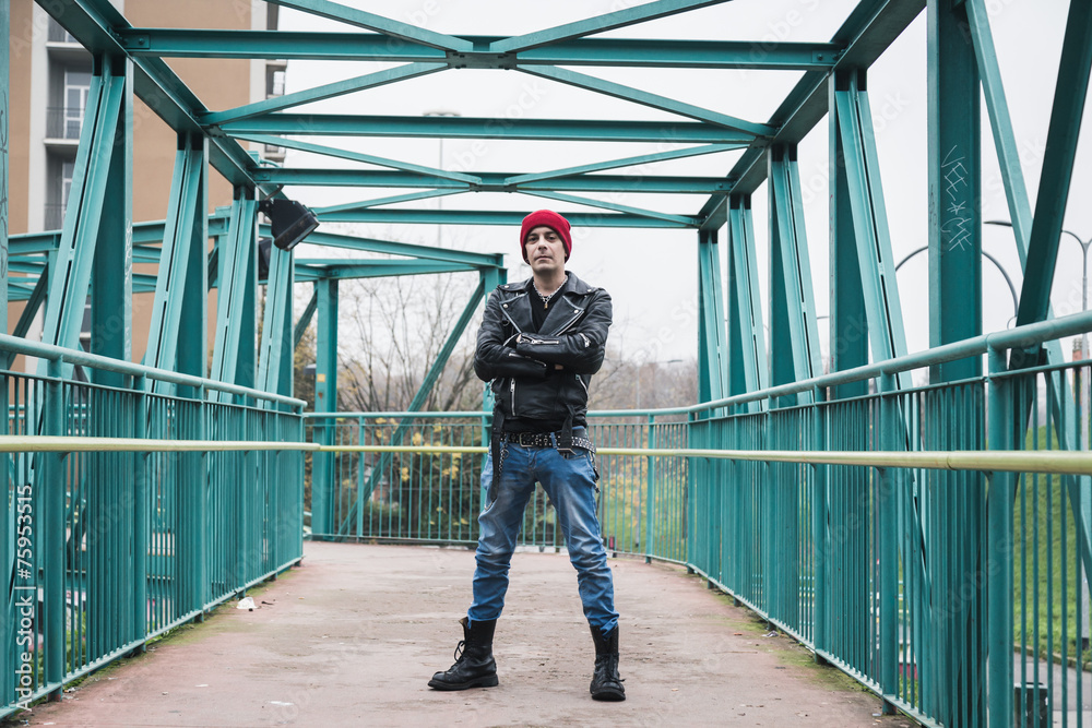 Punk guy posing in the city streets