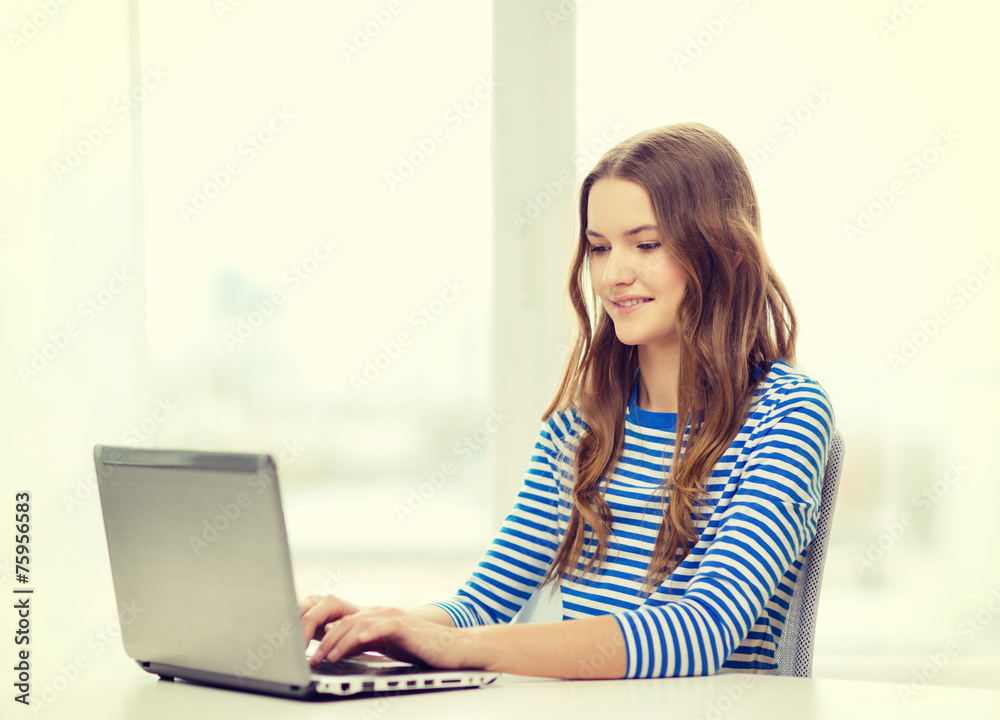 smiling teenage gitl with laptop computer at home smiling teenage gitl with laptop computer at home