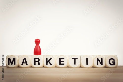 King pawn on the word Marketing