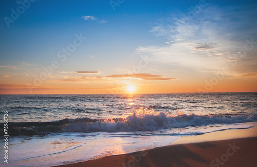 Scenic view of beautiful sunrise above the sea. © vrstudio