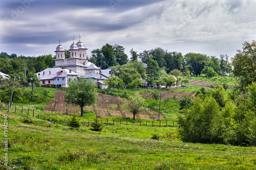 Slanic monastery in Arges county on a cloudy day photo