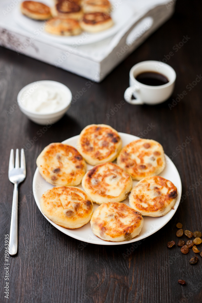 Delicious homemade cheese pancakes with coffee Delicious homemade cheese pancakes with coffee