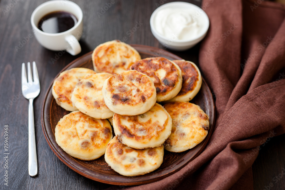 Delicious homemade cheese pancakes with coffee