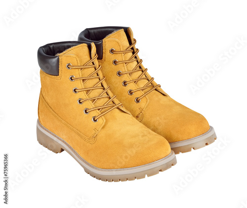 Yellow leather boots isolated on white background with clipping