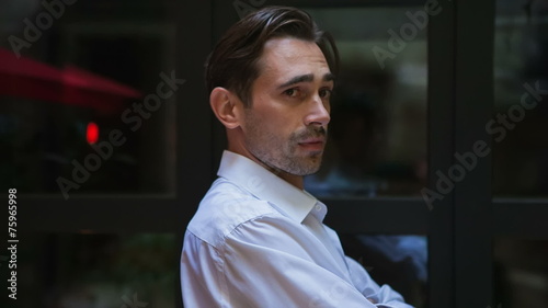 Man to turn around, looking with contempt
