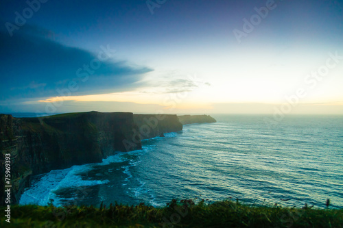 Cliffs of Moher at sunset in Co. Clare Ireland Europe. © Voyagerix