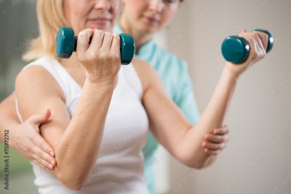 Exercising with dumbbells