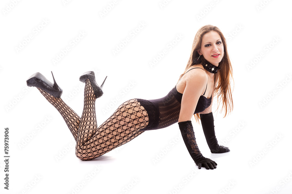 Fototapeta premium go-go girl in black stockings, swimsuit and gloves kneeling