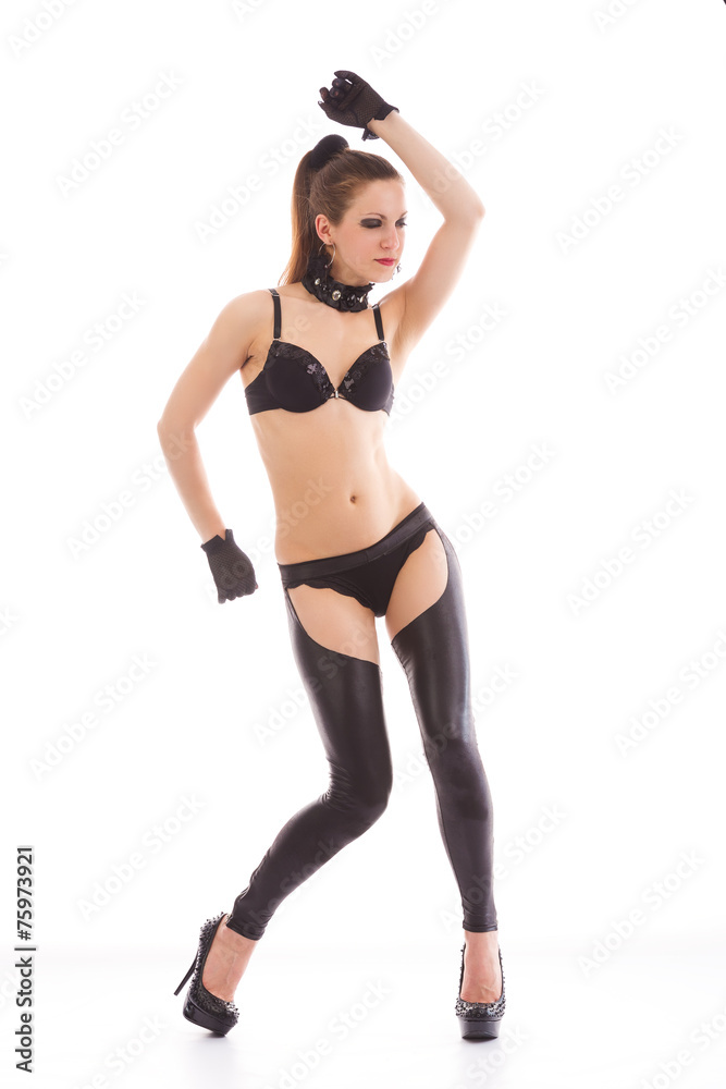 go-go dancer with long tail in black bra, panties, leggings