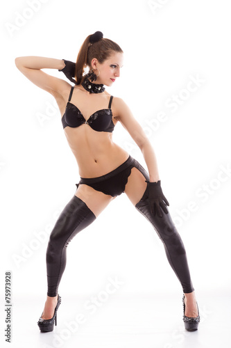 go-go dancer with long hair in a black bra