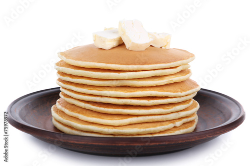 Stack of delicious pancakes with butter