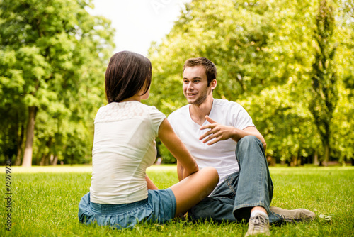 Young couple talking outdoor © Martinan