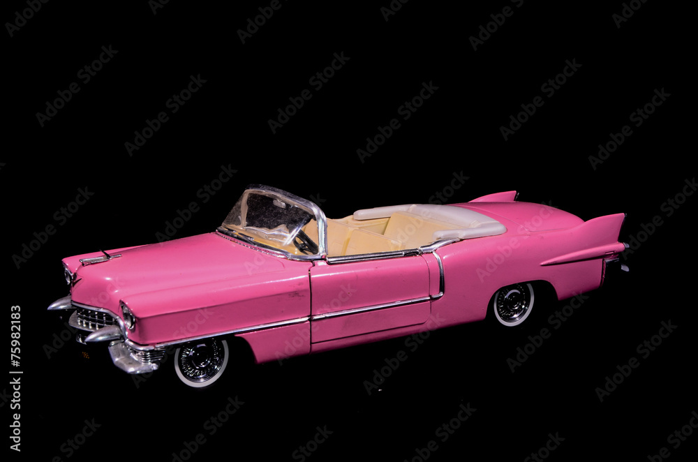 Obraz premium Pink Caddilac Car Toy Model