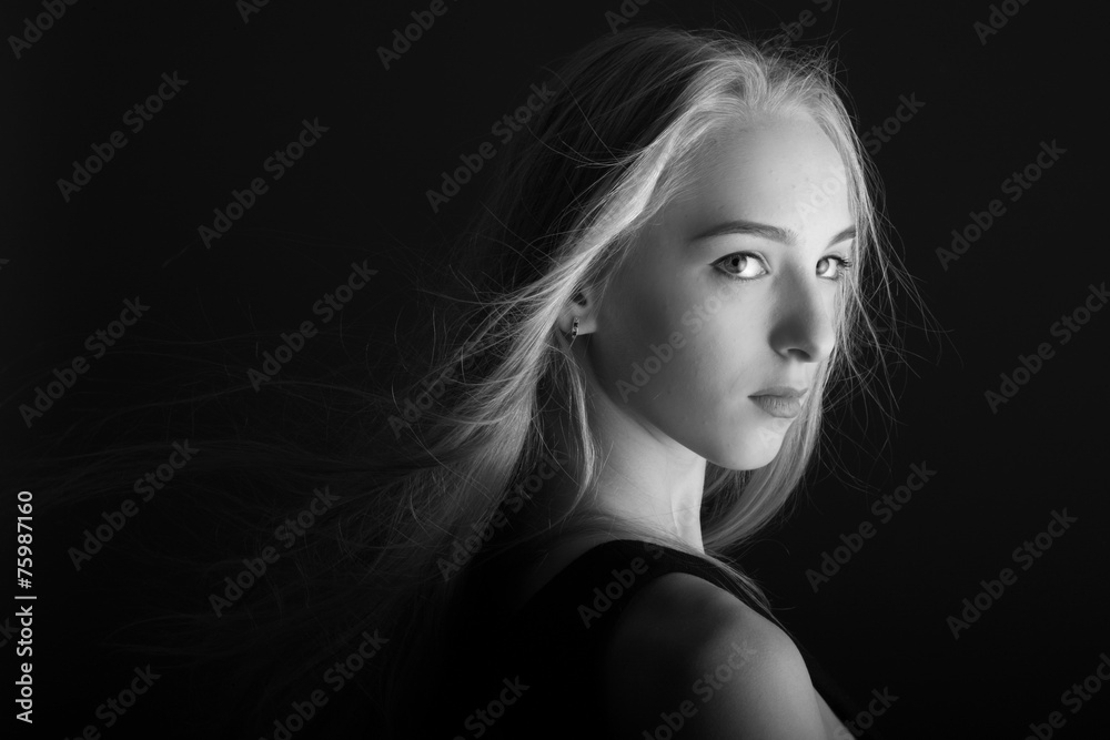 Young lady portrait in moonlight, monochrome