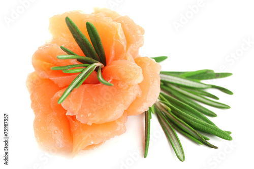 Sliced and rolled salmon isolated on white