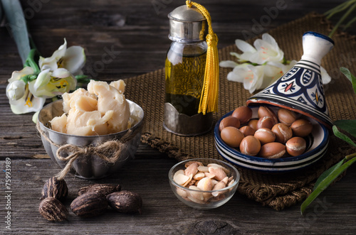 Argan oil and fruits with Shea butter and nuts photo