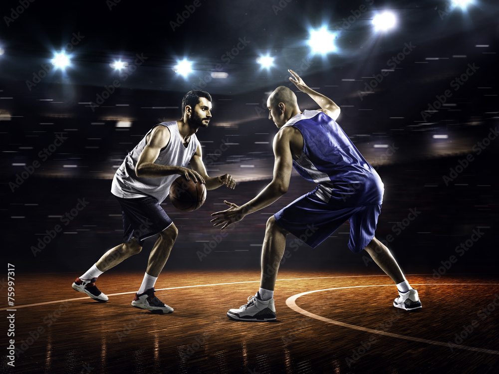 Two basketball players in action Two basketball players in action
