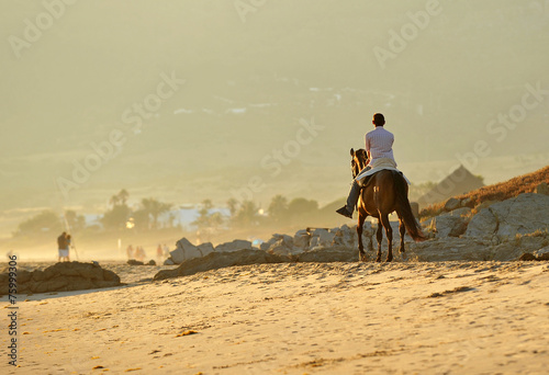 Tourist riding on the beach of Bolonia, Tarifa, Spain