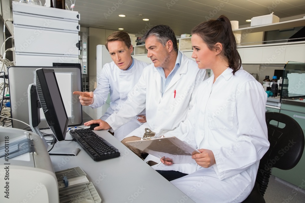 Team of scientists working together Team of scientists working together