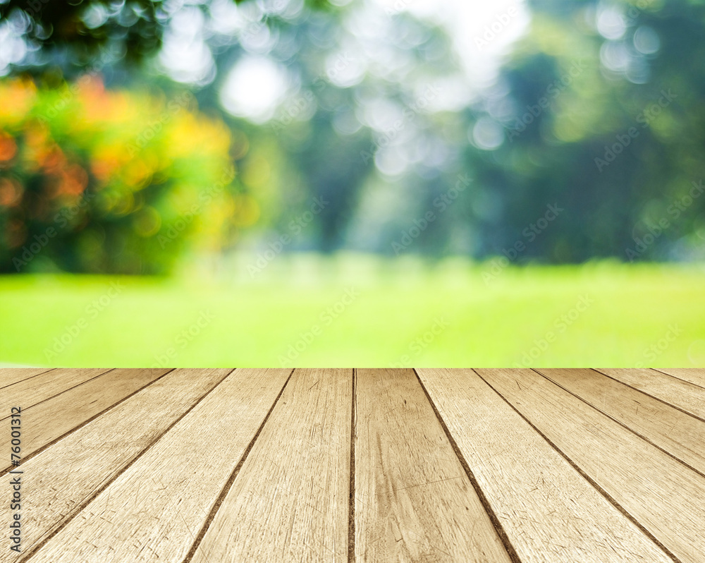 Empty perspective wood over blur green leaves bokeh background Empty perspective wood over blur green leaves bokeh background