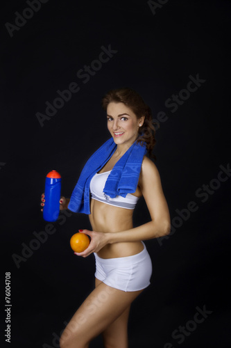 Fitness healthy girl with orange