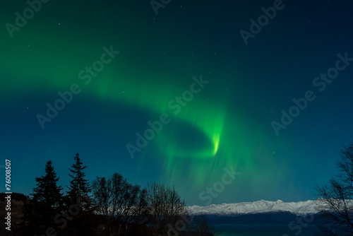 Bright green aurora over Kachemak Bay © latitude59