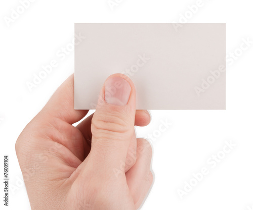 Hand holding a blank business card isolated on white