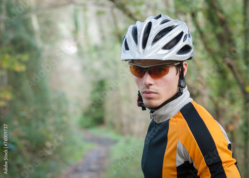 Cyclist portrait in the forest © ramonespelt
