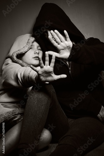Homeless mother with her daughter. Poor family.