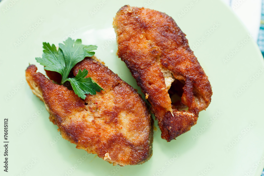 grilled pink salmon on green plate