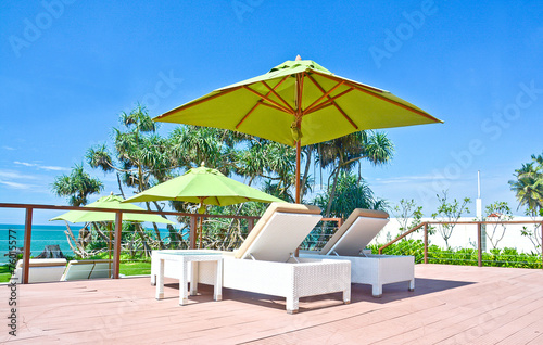 Beach Umbrella And Sunbath Seats © Saman Weeratunga