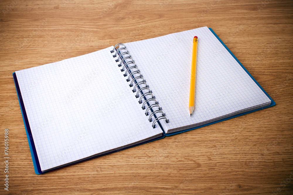 recycle notebook and wooden pencil on wood background recycle notebook and wooden pencil on wood background