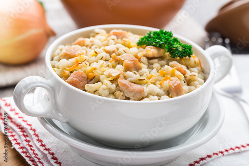 Fotografi Barley porridge with pork
