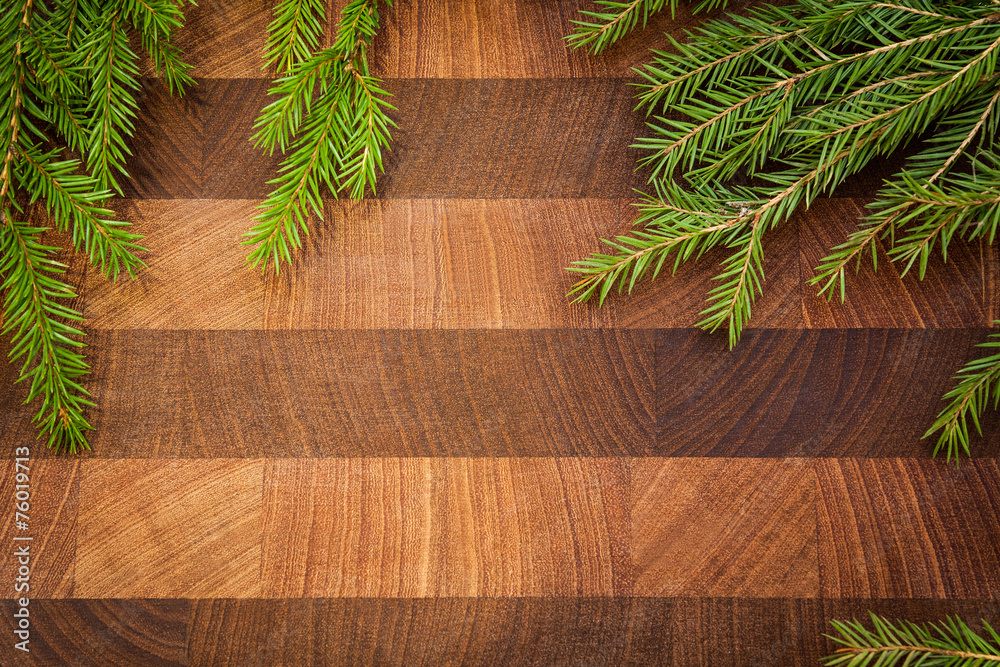 Christmas background with fir tree on old wooden board Christmas background with fir tree on old wooden board