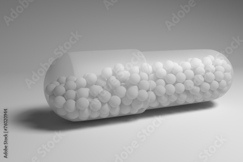 White pellets in capsule detail extreme close-up