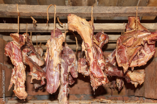 Smoked ham bacon and bones hanging
