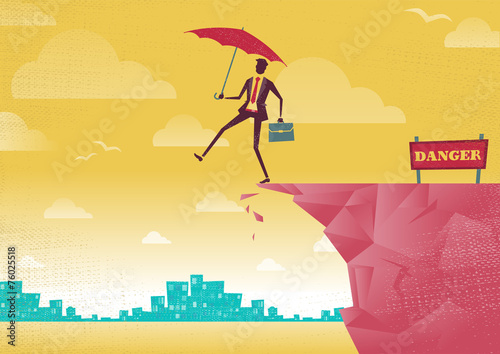 Businessman walks off a cliff.