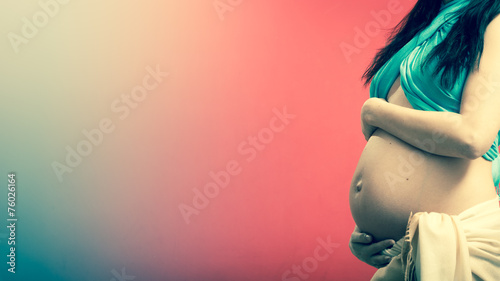 Closeup tummy of pregnant woman