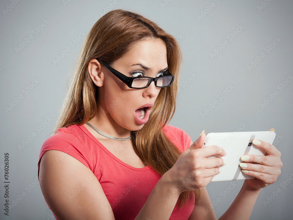 Studio shot of a young girl shocked Studio shot of a young girl shocked