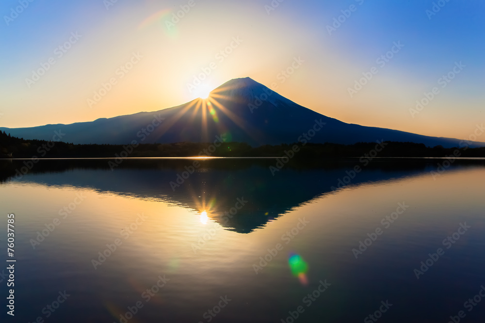 Silhouette of Mount Fuji reflected in Lake Tanukiko Silhouette of Mount Fuji reflected in Lake Tanukiko