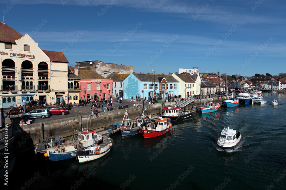 Weymouth harbour on a bright sunny summer day