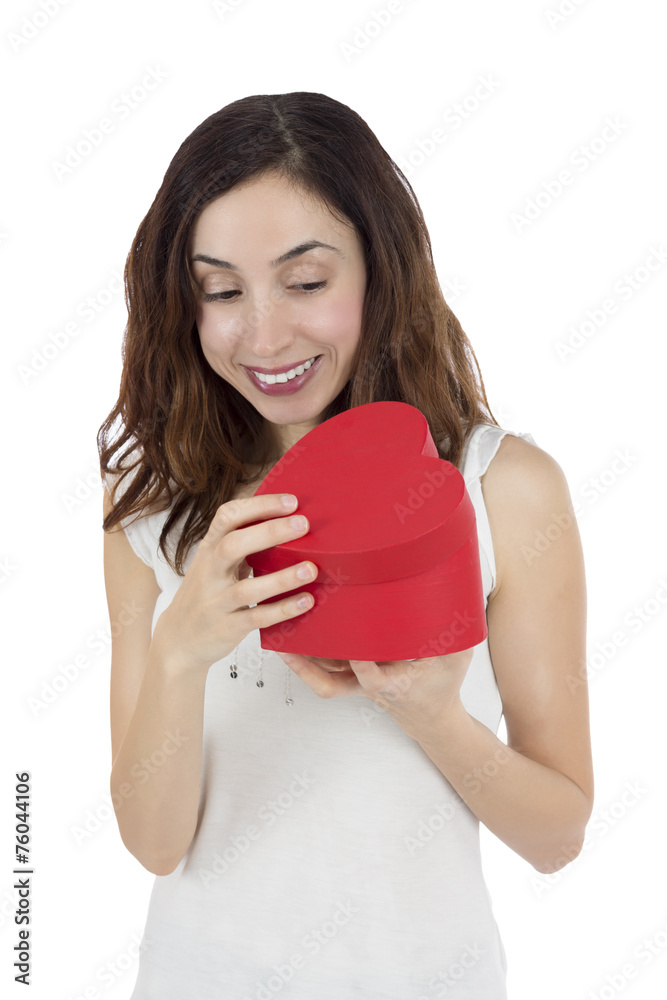 Excited valentines day woman looking to her present Excited valentines day woman looking to her present