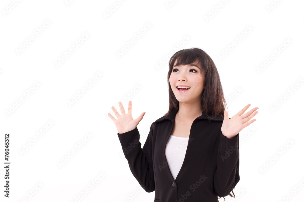 exited, surprised business woman looking up to blank space exited, surprised business woman looking up to blank space