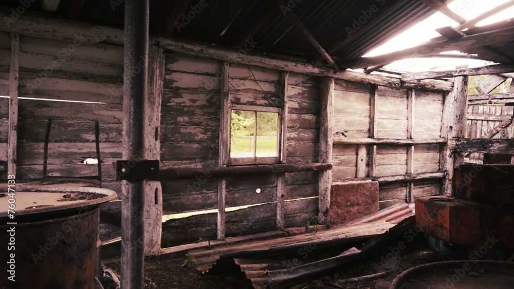 An old abandoned building in a small town on a summer day. An old abandoned building in a small town on a summer day.