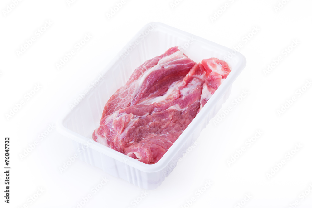 raw pork in plastic box package isolated on white background raw pork in plastic box package isolated on white background