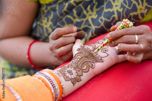 applying henna on hand, wedding ,Rajasthan, India