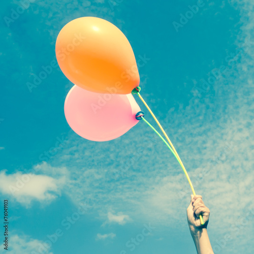 Balloons in the sky with filter effect retro vintage style