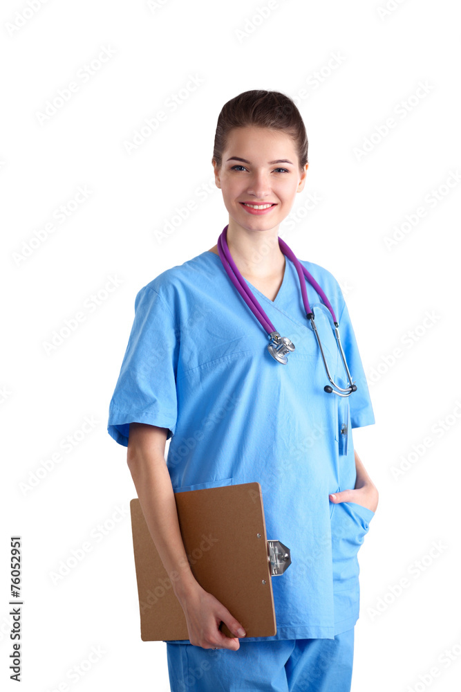 Smiling female doctor with a folder in uniform standing at Smiling female doctor with a folder in uniform standing at